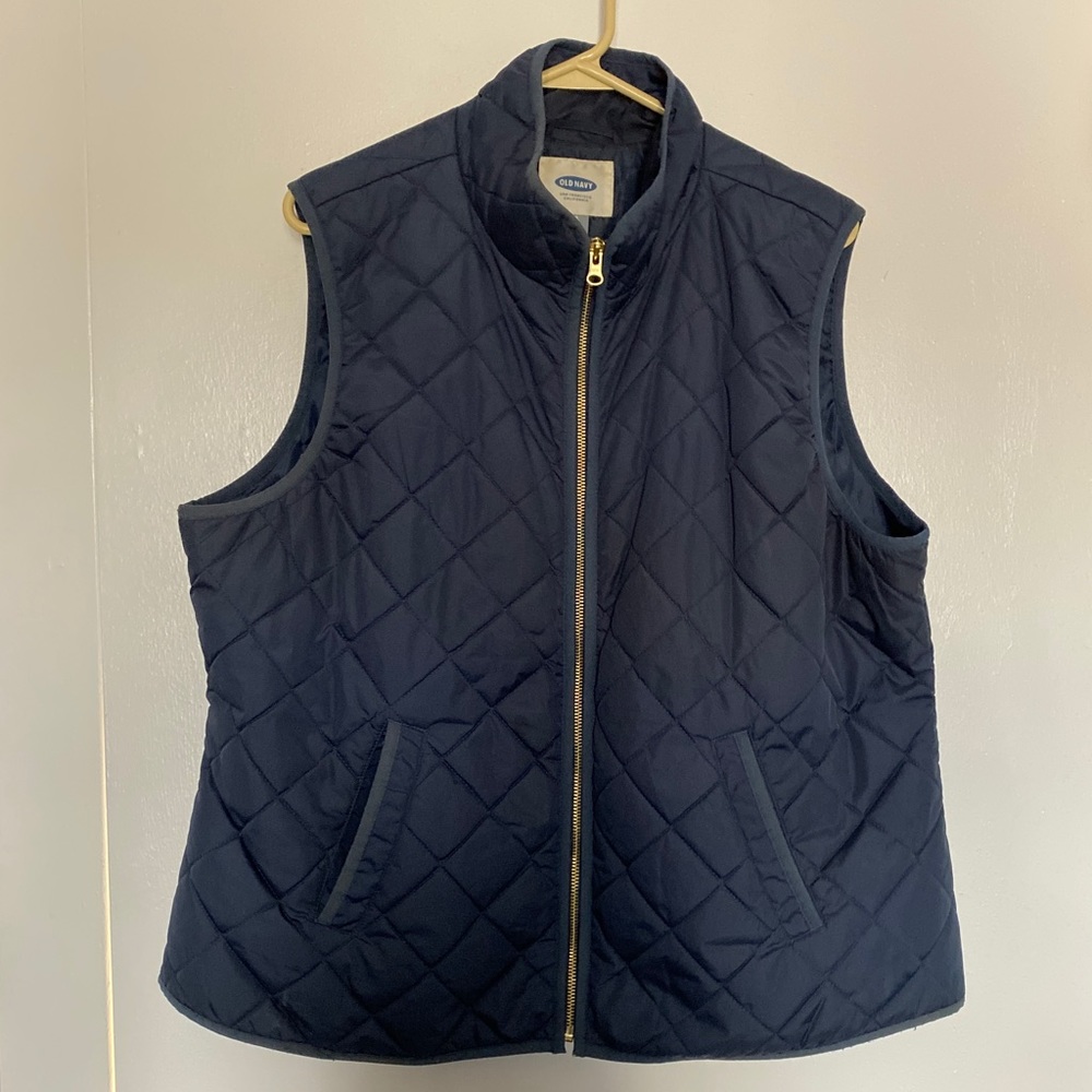 Navy blue quilted vest
